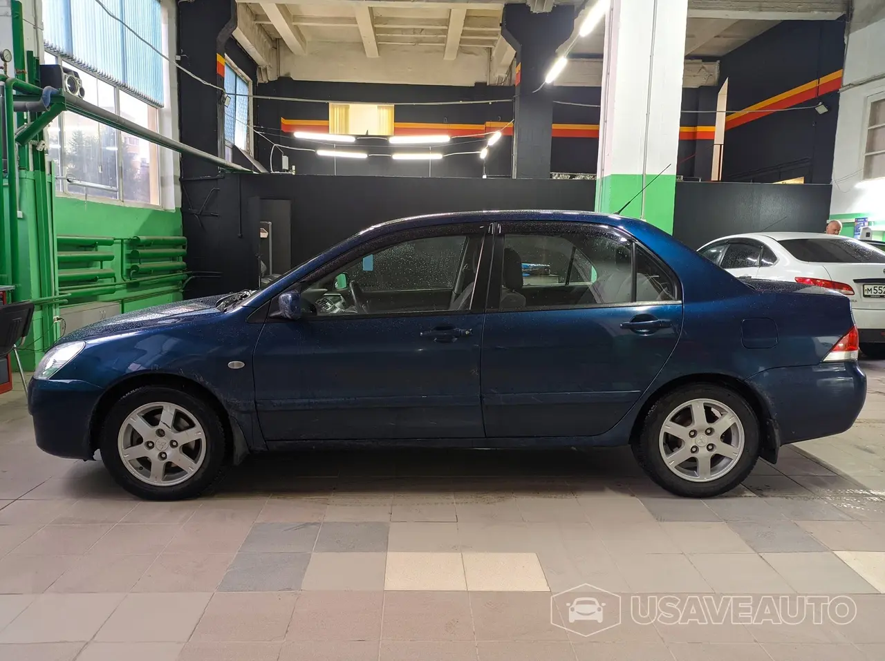 Тонировка задней полусферы на Mitsubishi Lancer