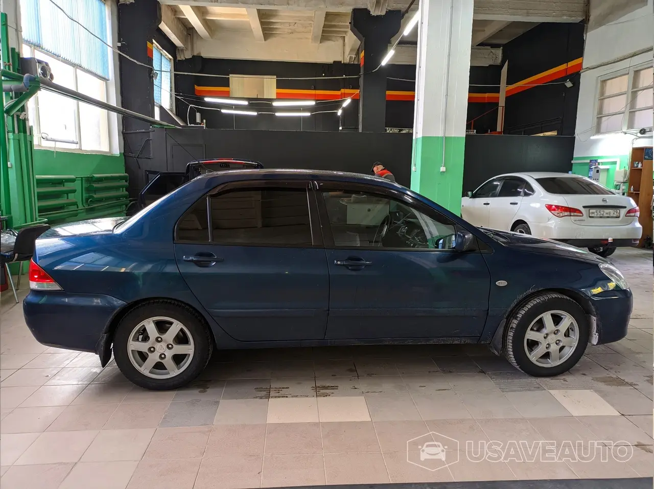 Тонировка задней полусферы на Mitsubishi Lancer